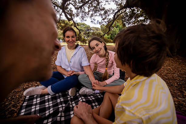 istock Parents and Children Spending Quality Time in Park 2207166685