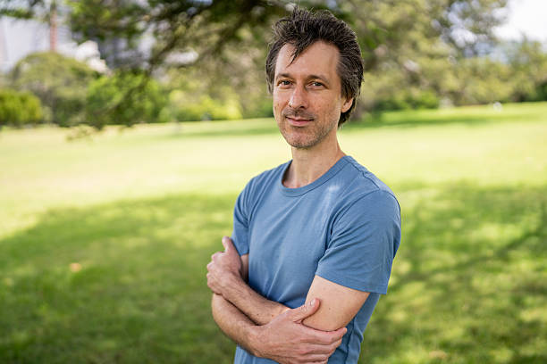 istock Man Enjoying a Peaceful Day in the Park 2207167614