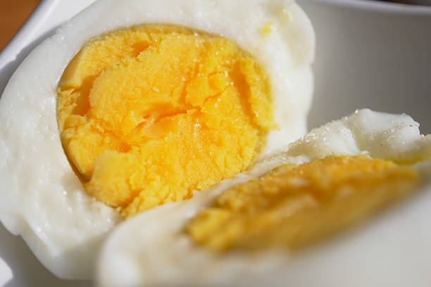 istock An UpClose Image of SoftBoiled Eggs Beautifully Sliced in Half 2207167912