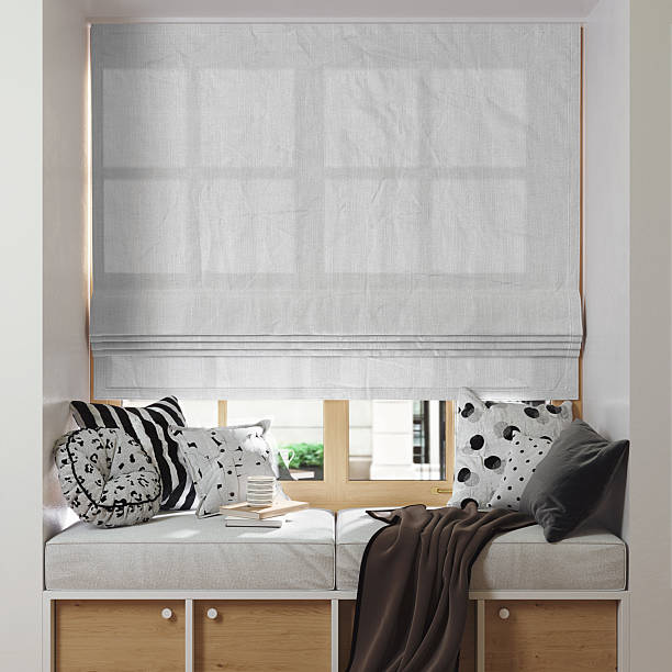 istock Roman blind on a window with wide windowsill mockup. 3D rendering 2207173519