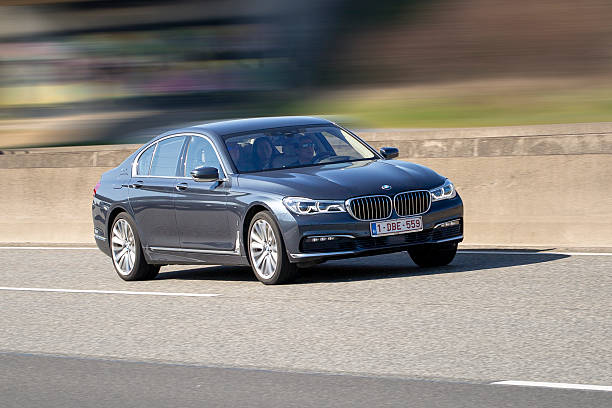 Diedenbergen, Germany - March 20, 2025: BMW 7 Series on German highway A3 nearby wiesbaden. BMW 7 Series are full-size luxury cars. BMW (Bayerische Motorenwerke AG) is a german automobile manufacturing company based in Munich, Bavaria