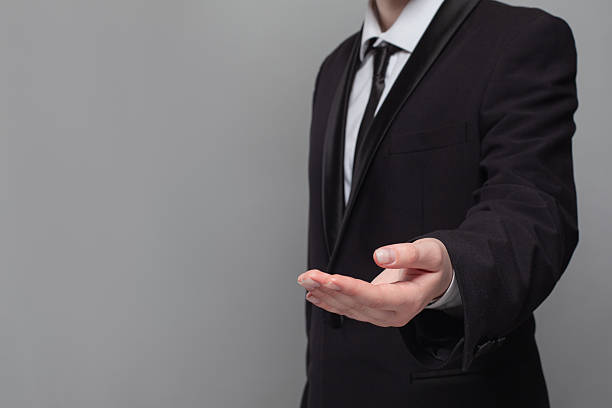 istock A young businessman extends his hand 2207175278