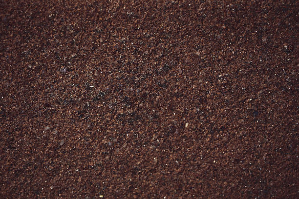 istock dark chocolate color of ancient laterite wall 2207175423