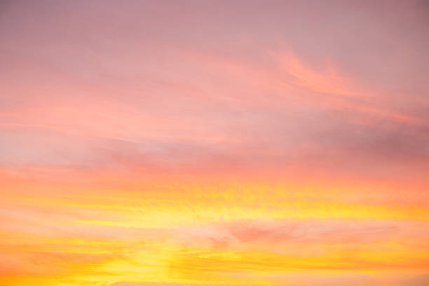 istock Beautiful , luxury soft gradient orange gold clouds and sunlight on the blue sky perfect for the background, take in evening,Twilight, Large size, high definition landscape photo 2207175621