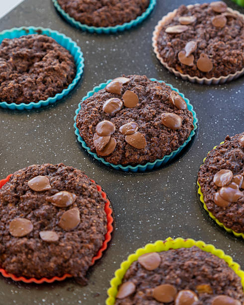 istock chocolate banana muffins on light background 2207176176