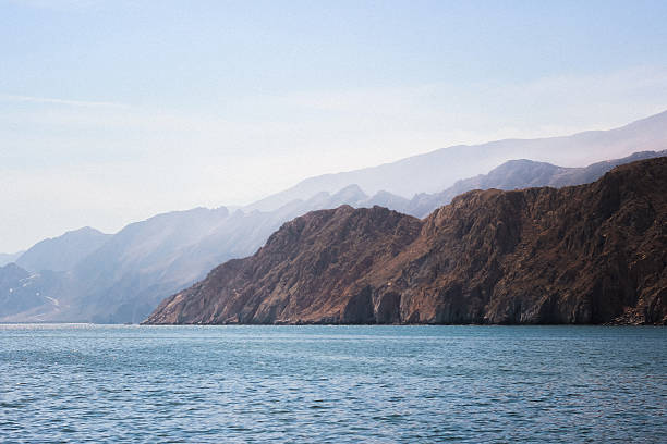 Sea view of rocky mountains