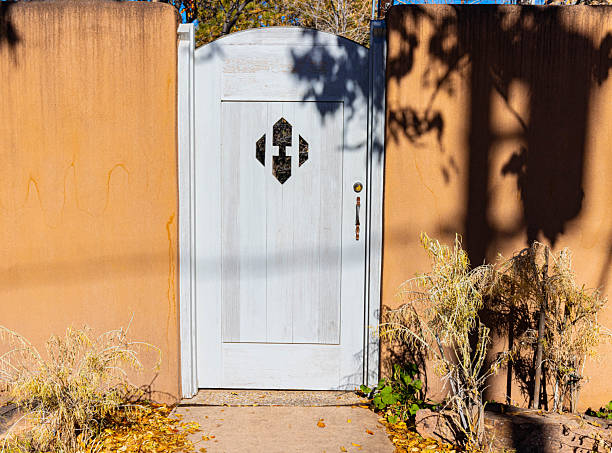 Wooden Door With Adobe Architecture on Historic Canyon Road, Sante Fe, New Mexico, USA
