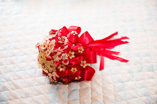 red roses in the bride's hand