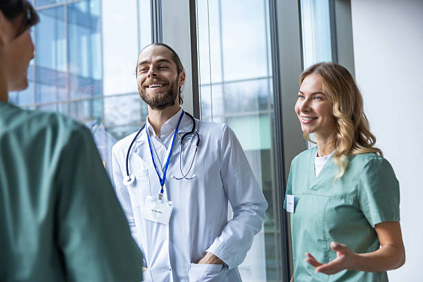 istock Group of doctors discussing something and looking excited and interested 2207190715