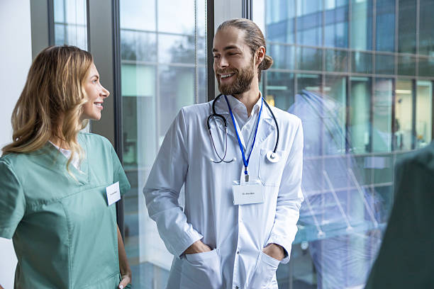 istock Group of doctors discussing something and looking excited and interested 2207190716