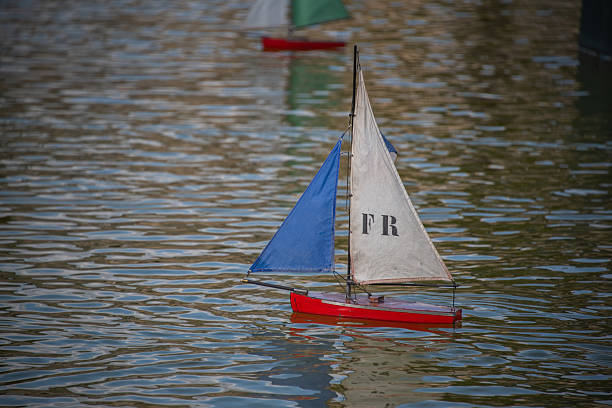 Water sport in Lake Lucerne, Switzerland. Training of children on dinghies