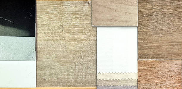 istock close up view of interior material samples including wooden ceramic tiles, real wood laminate flooring tile, palette of solid acrylics, drapery fabric catalog. 2207196949