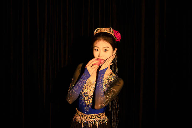 istock Uyghur dancer, beautiful woman, portrait, 2207199331