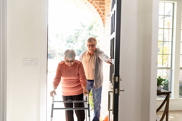 istock Senior Couple Entering Home, Assistance and Support 2207202148