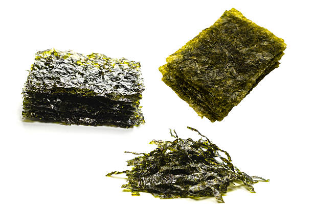 istock Tasty nori seaweed isolated on white. 2207202651