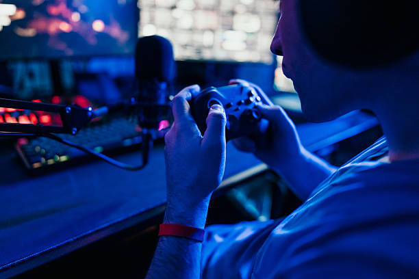 istock Professional gamer playing and streaming online video game 2207205950