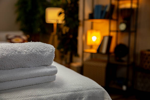 istock A truly relaxing spa setting that features plush towels and soft, ambient lighting throughout 2207210065
