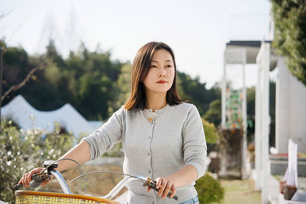 asian female outding with bike