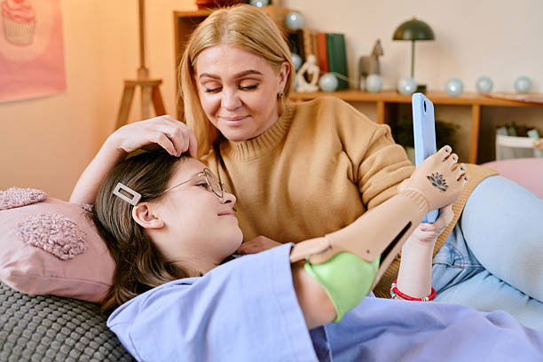 istock Portrait of Woman and Child Using Tablet Device 2207212682