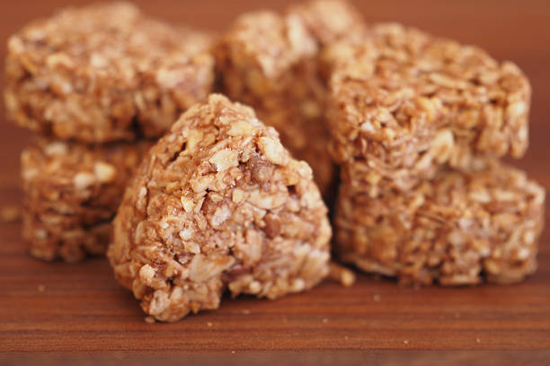 istock Nutty Granola Snack Bites Arranged Artfully on a Wooden Surface 2207212800