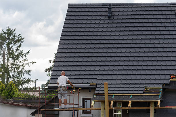 istock A roofer installs new shingles on a residential home 2207214241