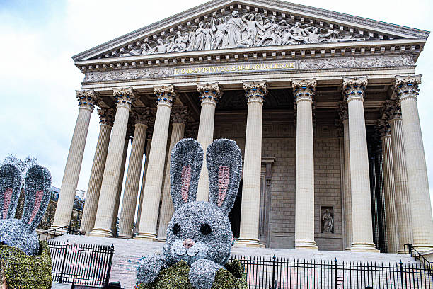 Image of an Easter Bunny in front of the La Madeleine church in Paris. Image takin March 2024
