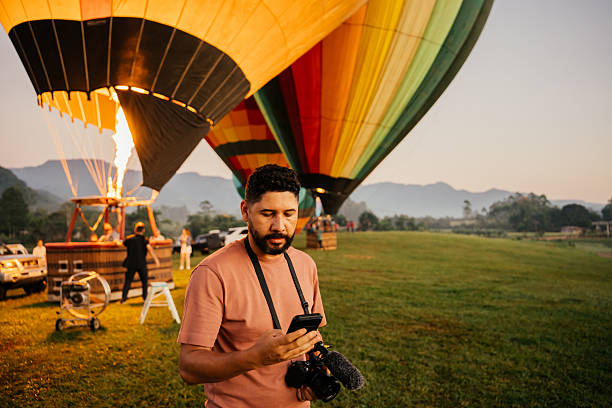 istock Latino man taking selfie in hot air balloon 2207216975