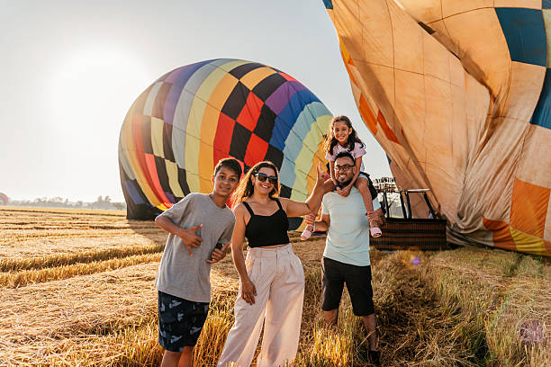 istock Happy family for hot air balloon flight 2207217049