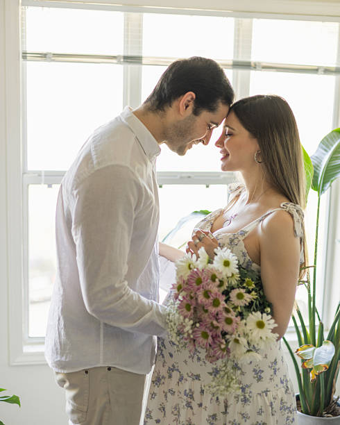 istock 8 Months Pregnant - Middle Eastern Tunisian Couple - Window Lit Maternity 2207218460