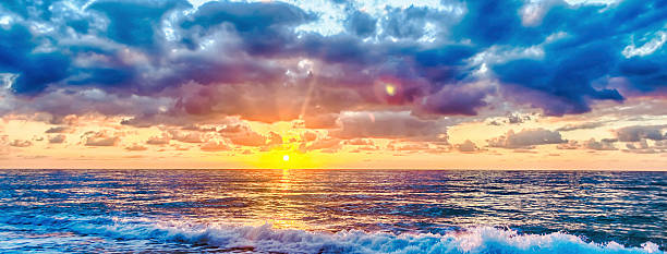 istock Sunset on the sea with a scenic cloudy sky, Italy 2207221316