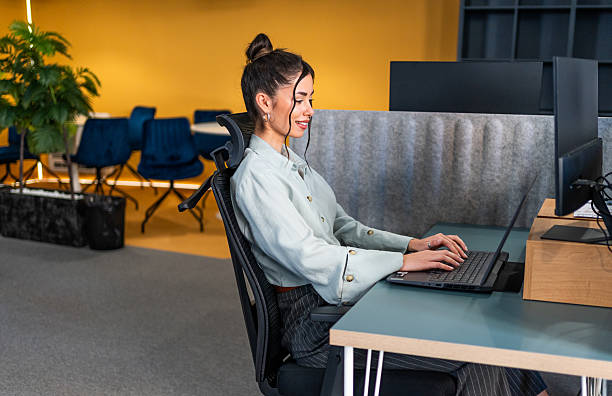 istock Woman working on a laptop in the office 2207225235