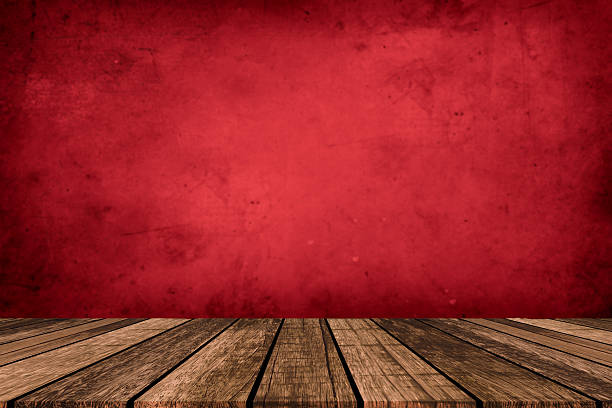 istock Empty wood table at foreground with brown or red color fabric wallpaper at background for product placement displayed. empty brown wooden deck table with red background for luxury concept. 2207226384