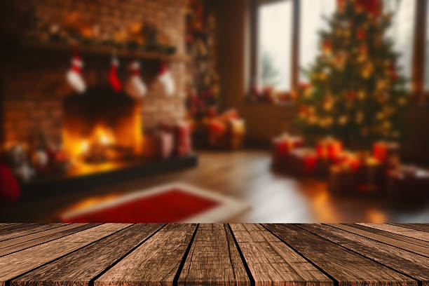 istock Empty table in front of christmas tree with decorations background. For product display montage 2207226389
