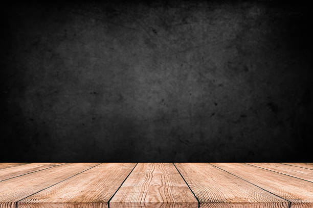 istock Wooden table in dark room background concept for advertising. 2207226446