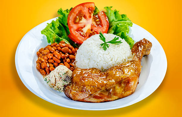 istock Rice, beans, roast chicken, salad and farofa 2207229201