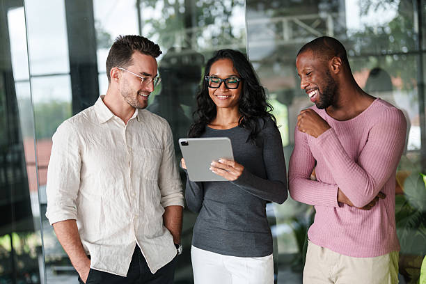istock Diverse Business Team Sharing Digital Ideas In Modern Office 2207229906
