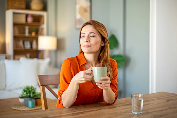 istock Woman enjoying coffee 2207236894