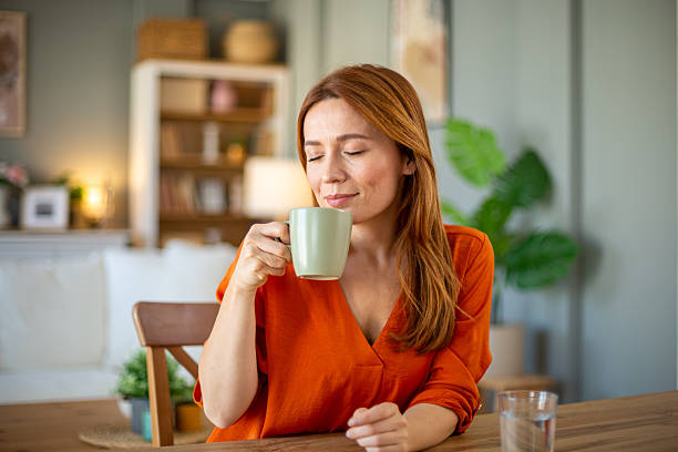 istock Woman enjoying coffee at home 2207237042