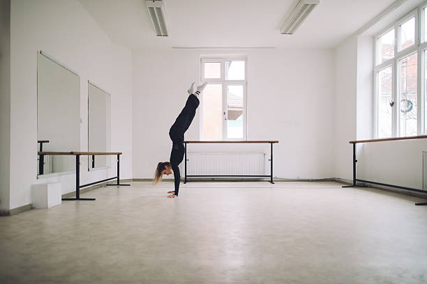 Dancer in minimalist dance studio ambiance