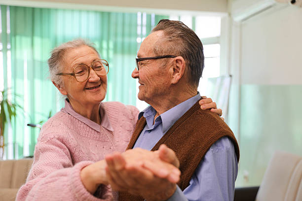 istock Elderly Couple (80+) Dancing in a Nursing Home 2207240323