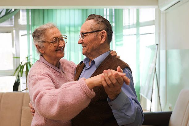 istock Elderly Couple (80+) Dancing in a Nursing Home 2207240450