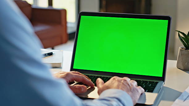 istock Businessman fingers scrolling mockup laptop touchpad working remotely closeup 2207245983