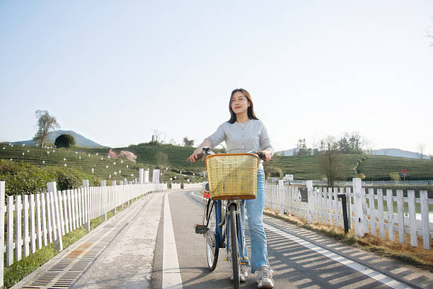 asian female outding with bike