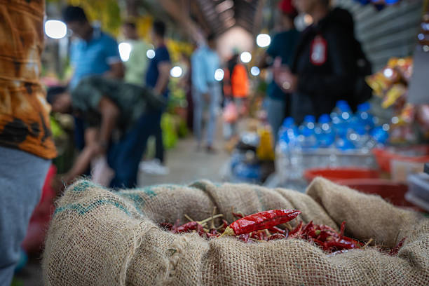 Nuwara Eliya Sri Lanka - September 6 2024; Sack of red chilli in foreground to out of focus background inside Victorian Central Market building.