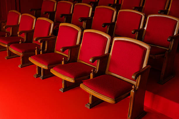 istock Vintage Theater Seats with Red Upholstery 2207255551