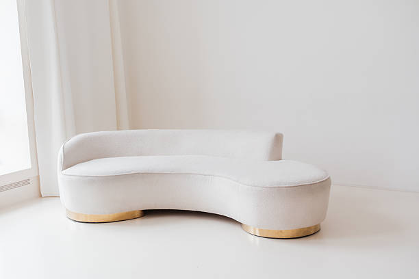 istock White Curved Sofa in Modern Living Space 2207255553