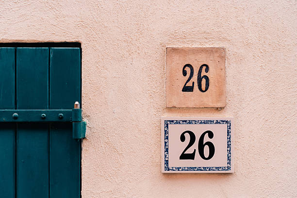 istock Rustic architecture with number 26 on wall for vintage design inspiration 2207260608