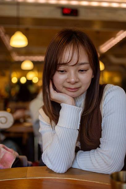 istock Woman relaxing in cafe, waiting for lunch 2207269866