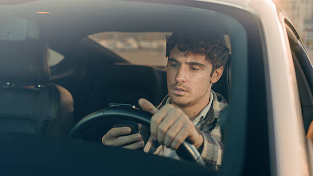 istock Disappointed stressed sad man Caucasian auto driver businessman inside automobile car waiting in traffic jam using mobile phone read bad news upset displeased loss gps navigation road driving in city 2207273334