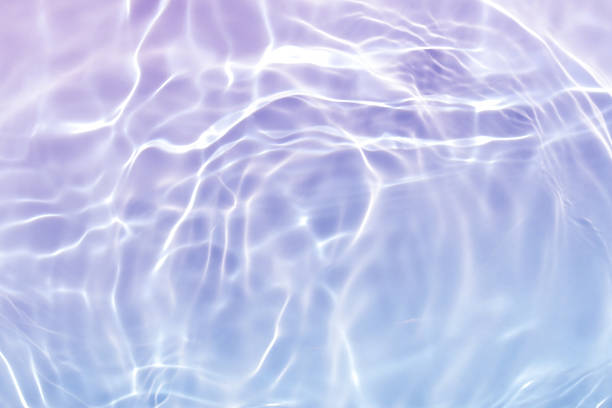 istock abstract blue purple water wave. natural swirl pattern texture. background photography. 2207282174